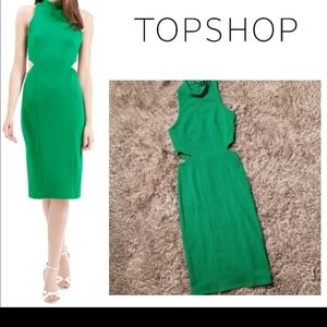 Full length green dress with side cut outs